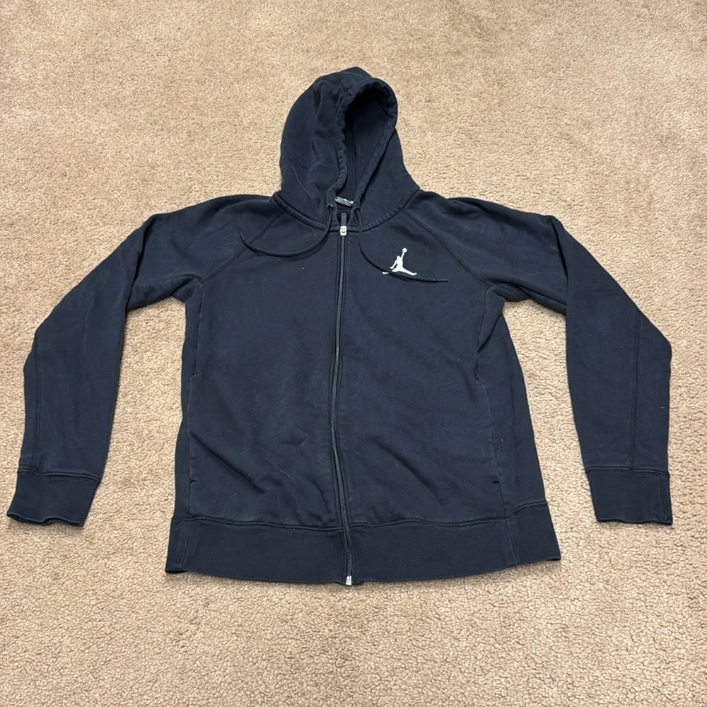 Jordan women zip up hoodie. Medium